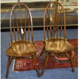 A set of four early Ercol 'quaker back' chairs,