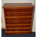 A modern yew wood chest of drawers, with six drawers,