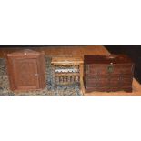 A carved wood corner cabinet, with panelled door, 70cm high x 66cm wide, also with a blanket box,