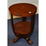 An Art Deco walnut two tier occasional table, with circular top,