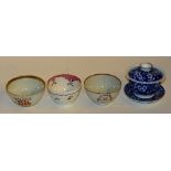 Three 19th century Chinese tea bowls, all bearing enamel decoration, 9cm diameter,