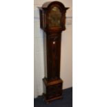 An oak granddaughter clock by Tempus Fugit, the hood with glazed door enclosing brass dial,
