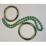 A string of green jade style beads, 50cm long unfastened,