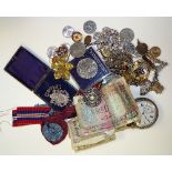 A small quantity of costume jewellery, world bank notes and coins,