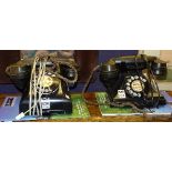 Two vintage black bakolite telephones,