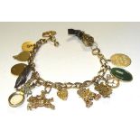 A 14ct gold charm bracelet, originally belonging to 1950's actress Terry Moore,