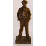 A large French bronzed figure of a boy, bearing label for 'Le Siffleur', raised on plinth base,