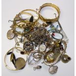 A small quantity of costume jewellery, to include 9ct gold star earring, silver lockets,