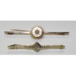 A 15ct gold diamond bar brooch, the small brilliant cut diamond set in gold diamond formation,