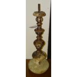 A 17th century Italian wooden painted pillar candlestick, of bulbous, turned form (a/f),