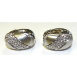 A pair of 18ct white gold diamond earrings, of striped diamond and frosted gold formation,