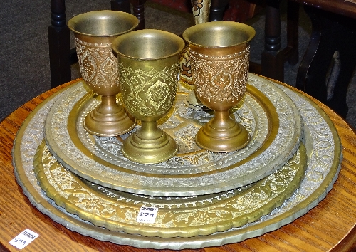 A mixed lot of Middle Eastern brass and white metal wall plaques,