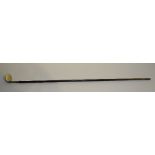 **A golf club head Sunday stick, the short iron head on wooden shaft,