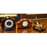 A walnut cased mantel clock, the white enamel dial with Arabic numerals, 14cm high,
