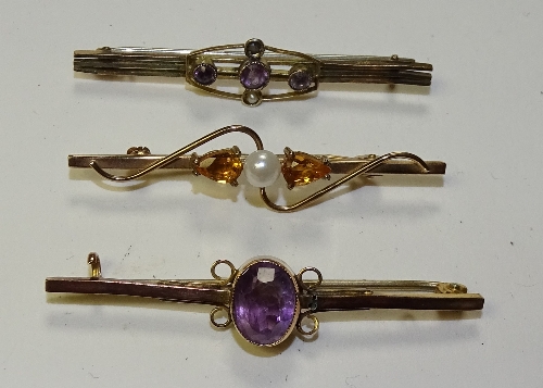 A 9ct gold amethyst bar brooch, 5cm long, together with a 9ct gold citrine and pearl brooch, 4.