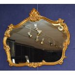 A Rococo style gilt wall mirror,