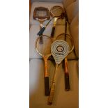 A mixed lot of vintage wooden tennis and badminton rackets,