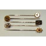 Five 15ct gold tie pins, of various designs to include diamond, ruby and sapphire examples, 6.