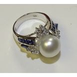 A 14ct white gold pearl, sapphire and diamond ring,