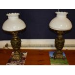 A pair of Neo-Classical style table lamps, with shades,