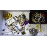 A small collection of costume jewellery, to include brooches, faux pearls, earrings,