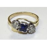 A Victorian 18ct gold sapphire and diamond ring, the central square cut sapphire,