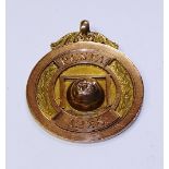 A 9ct gold medal, inscribed 'PCSFA 1928' to obverse,