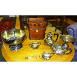 A quantity of plated wares, to include large punch bowl with lion mask ring handles, plated tea set,