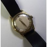 A vintage Omega gents automatic wristwatch circa 1960s, the champagne dial with baton numerals,