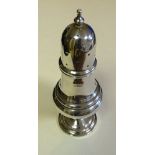 A silver sugar sifter/pepper pot, hallmarks for Birmingham 1909, makers marks rubbed,