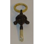 An early 20th century silver, bone and mother of pearl baby's rattle, hallmarks for Birmingham 1913,