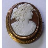 A 9ct gold cameo brooch, with Grecian female, stamped 9ct, 4.