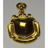 A 9ct gold sporting medal,