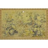 A wall hanging tapestry, of rectangular form depicting deer in foliage,