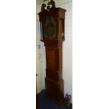 A George III mahogany inlaid and oak grandfather clock,