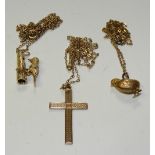 A 9ct gold crucifix pendant on chain, stamped 9ct to pendant and clasp, 2.