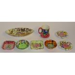 A small collection of Maling ware, to include a pair of floral ashtrays, floral mug,