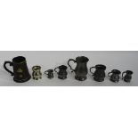 A group of six graduating pewter tankards, ranging from 1/4 gill to 4 gills,