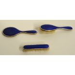 A vintage blue guilloche enamel brush set, in fitted box circa 1920/30's, comprising of hair brush,