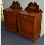 A pair of late Victorian bedside cupboards,