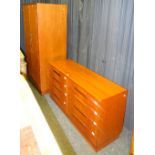 A Retro G-plan teak wardrobe with two drawers, label to interior,