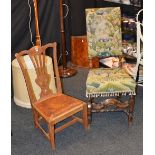 A vintage Arncroach oak nursing chair, with pierced splat back rest, 81cm high,