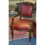 A Victorian mahogany and red leather armchair,