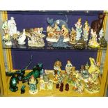 A quantity of figurines, to include Lladro figure of a goose, Naturecraft, Blue Mountain,