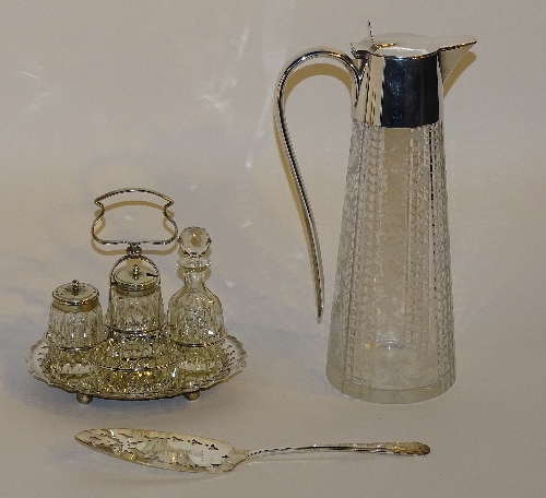 An etched claret jug, with plated mounts,