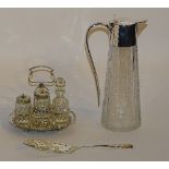 An etched claret jug, with plated mounts,
