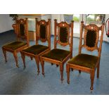 A set of four Arts & Crafts oak dining chairs, circa early 20th century,