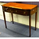 A reproduction serving table, with shaped top above two drawers,