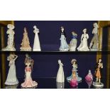 A quantity of porcelain figures by Coalport, Royal Doulton and Nao,