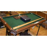 A 1930's Riley child's table top snooker table, 130 x 69cm,